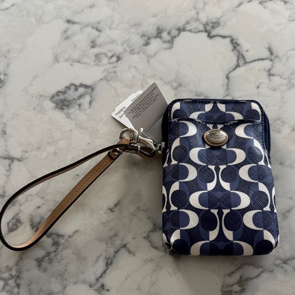 Coach Handbags - Coach Navy and White Signature Wristlet